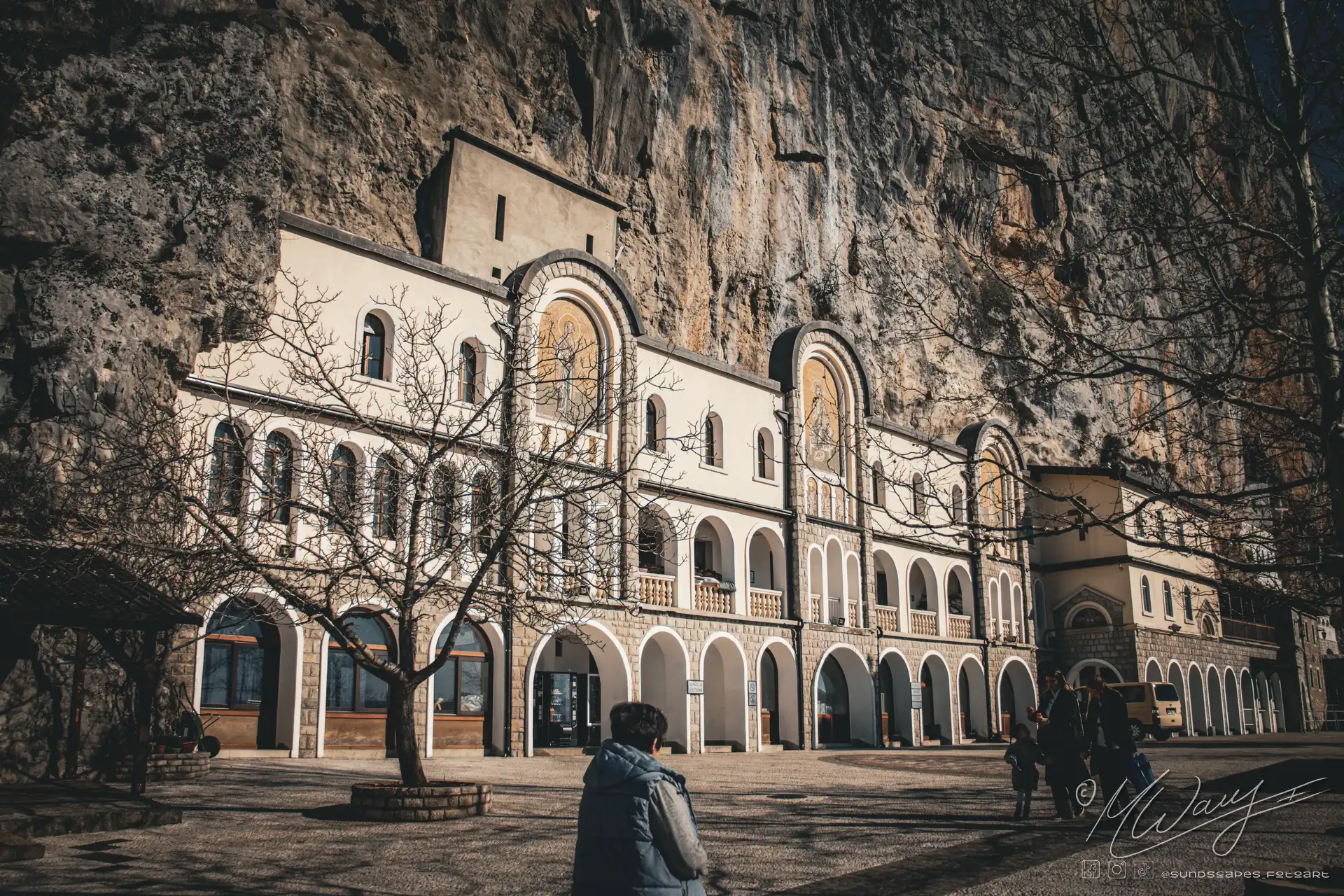 a monastery built into a mountain