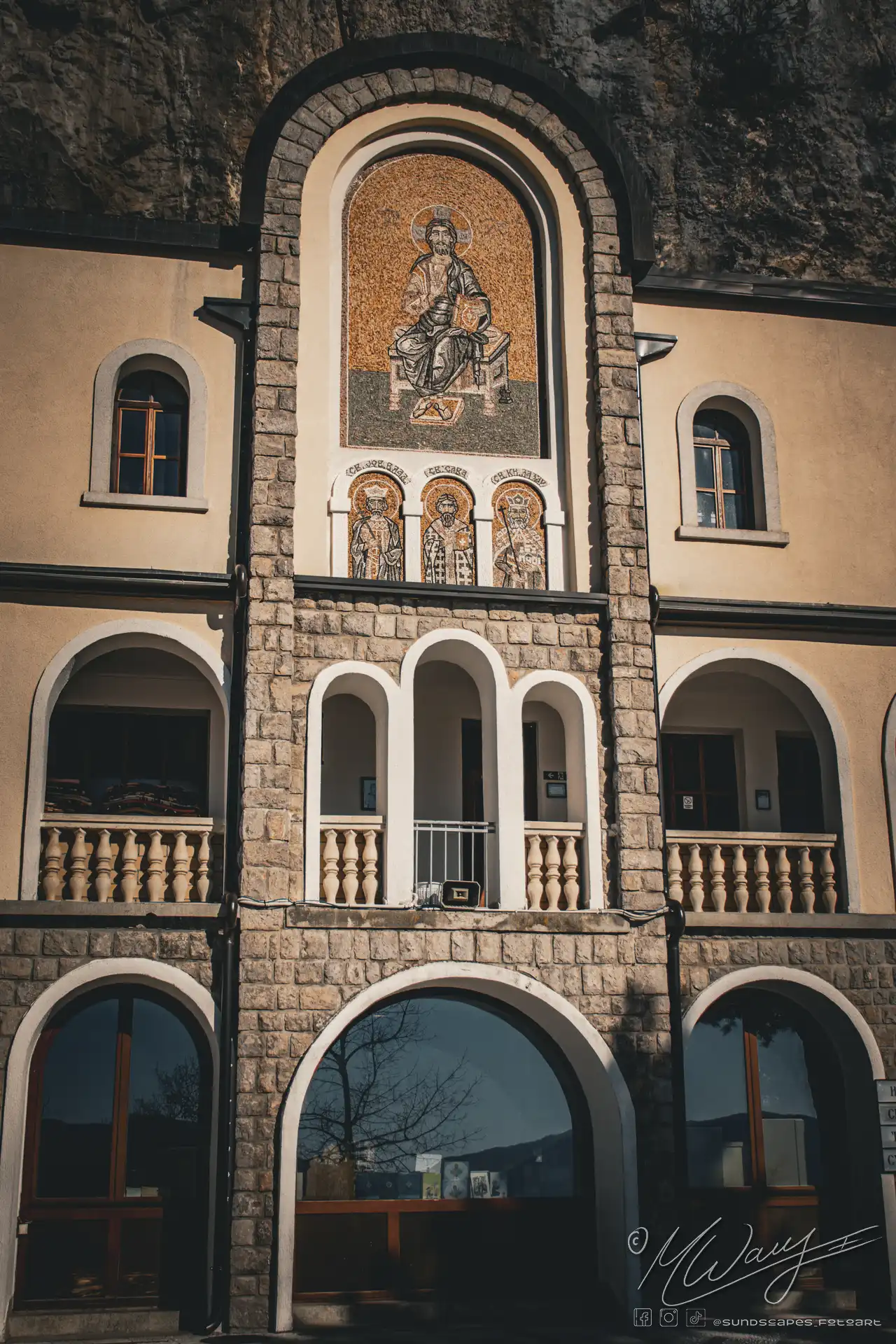 a building with a mosaic on the wall