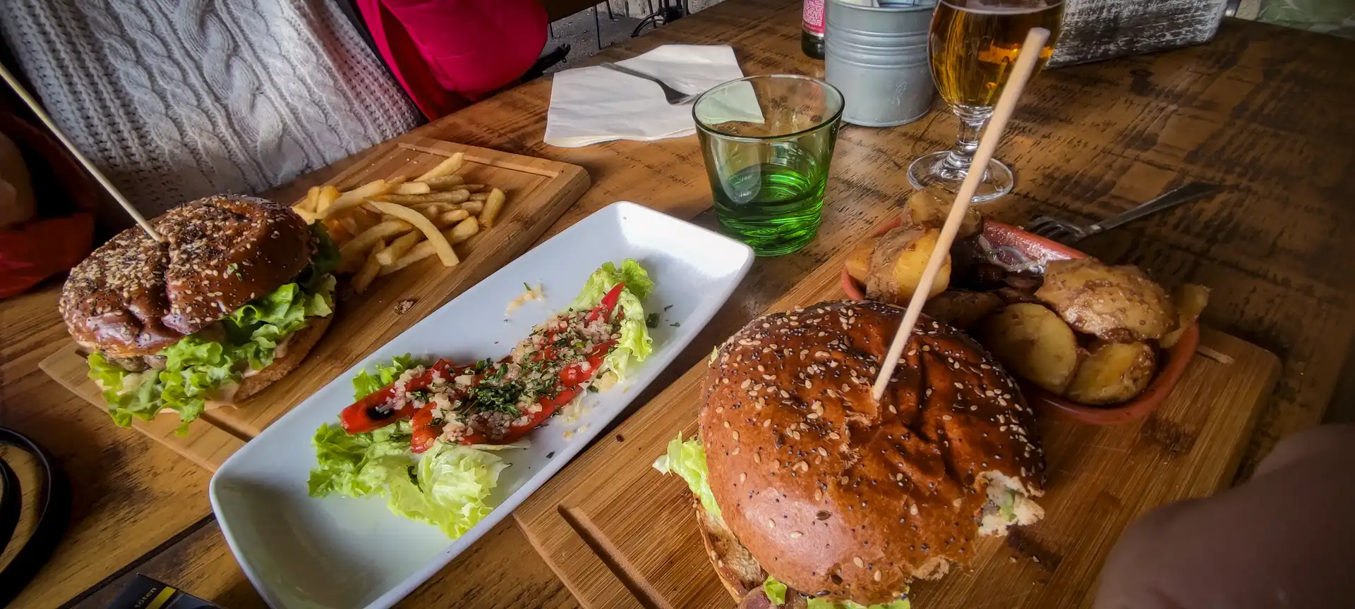 a burger and fries on a table